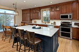 Although cherry cabinets are considered a darker shade, their reddish hue gives them a brighter appearance. Cherry Cabinet Dark Counter Backsplash Ideas Photos Houzz