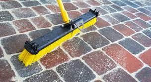 Sweep the sand into the cracks using a push broom, brush the sand back and forth over the pavers to filter the sand down through the cracks between pavers. Polymeric Sand Vs Regular Sand