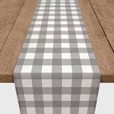 The pure cotton fabric is soft and the black and white plaid patterns. Gray Buffalo Check Table Runner Kirklands
