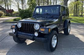 Image result for Brilliant Black 2003 Jeep