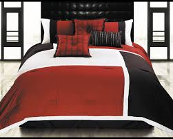 In addition to the metallic accents, a bright red, patterned pillow sits on the bed and fresh flowers add a hint of green on the nightstand. Red Black And White Bedroom Sets Set Atmosphere Ideas Wallpaper Backgrounds Wedding Art Photography Girl Camo Shoes Apppie Org