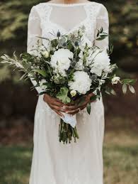 How To Have A Boho Chic Wedding In Michigan White Bridal Bouquet Emerald Wedding Colors Ivory Bridal Bouquet