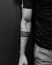 Line tattoos are considered minimalist tattoos because of their simplicity, but wearing a plain design has both symbolical and sleeve tattoos. Hand Band Tattoos Idea Design For Man S Armband Tattoos For Men Band Tattoos For Men Armband Tattoo Design
