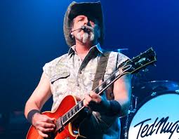 Damn Yankees Guitarist Ted Nugent Is Shown Performing On Stage During A 