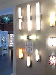 Shop modern sconces + wall lamps at design within reach. How To Light A Contemporary Bathroom With Wall Sconces Best Bathroom Lighting Contemporary Bathroom Lighting Bathroom Wall Sconces