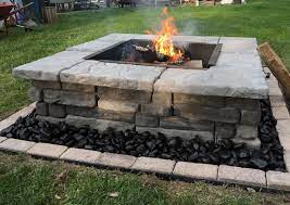 The burning area of this fire pit measures 22.24 x 22.24 x 5.71, and its overall dimensions measure 26.57 x 26.57 x 23.23. Random Stone Stacked Stone Fire Pit Natural Concrete Hardscapes