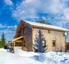 The bottom is perfect size for him to sleep in and he is a very big guinea pig. Two Storey Cottage On A Sunny Winter Day Private House On The Background Of The Sky With Clouds Wooden House In Winter Entrance To The Country House Stock Photo Picture And Royalty Free