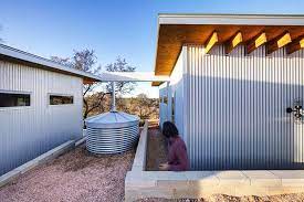 Welcome To Bestie Row Lifelong Friends Build Row Of Tiny Houses In The Middle Of Nowhere Tiny House Community Tiny House Small House Bliss
