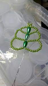 Pin By Berly Tejeira On Trajes Beaded Flowers Bead Crafts Beads And Wire