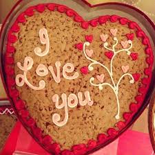 A gift you'll want to keep to yourself! I Decorated A Big Cookie Kinda Like This For Valentines Day For My Boyfriend One Time H Cookie Cake Designs Cookie Cake Decorations Chocolate Chip Cookie Cake