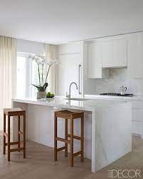 Kings brand white with marble finish top kitchen island storage cabinet. Tips Articles Natural Stone Online