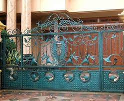 A gate is an entry point to any closed area, which also acts as a barrier to the external world. Wrought Iron Home Gate Design Ideas Wrought Iron Gates Home Gate Design Gate Design