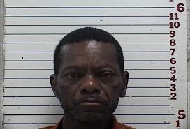 Ax attack results in charges for Lawton man