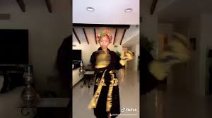 In the beginning of the track, she samples a snippet from nelly's hit record hot in herre and the st. White Robe Buss It Video On Twitter Chloe Bailey Busting Challenge Explained