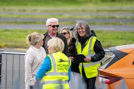 Phillip Schofield is all smiles in rare public appearance as he arrives at British  Grand Prix by helicopter | The Sun