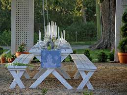 Cut fresh herbs from your garden and secure them to a small glass jar to create the perfect candleholder for tea lights and votive candles. How To Style An Outdoor Dining Table Diy