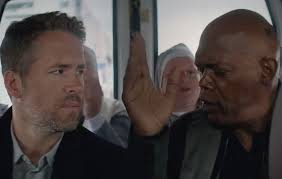 Taking a bullet for him. Movie Review Reynolds Jackson Yuk It Up Between Bloodbaths In The Hitman S Bodyguard Movie Nation
