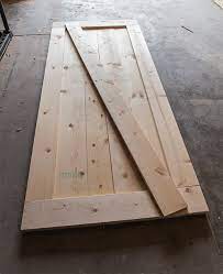 Build your own diy barn door hardware for $20! Diy Barn Door Plans Tutorial