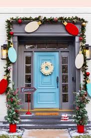 4k00:20large brick mansion covered in winter snow and decorated for christmas holidays. 30 Gorgeous Christmas Garland Ideas 2019 How To Decorate With Garland