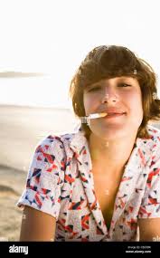 Smoking at the beach hi-res stock photography and images