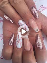 Two of the nails are covered in gold glitter. Rose Gold Glitter Nails Ombre Nail Skittlettes Manicure Nailart