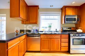 Cherry wood furniture is elegant, timeless, natural and strong. Modern Cherry Wood Kitchen In A City Apartment Stock Photos Freeimages Com