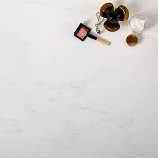 Arctic white quartz is a solid bright white slab with no pattern or veins, making it perfect for creating a clean canvas with endless design possibilities. Solid Surface Countertop Cotton White Staron Kitchen White