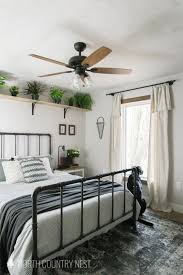 The shelving above it makes room for books and a printer. Guest Bedroom Ideas Pinterest Design Corral