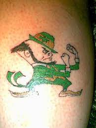 There are the familiar twists and turns of a celtic symbol. Pin By Porsha Spencer On Tattoos Irish Tattoos Fighting Irish Tattoo Leprechaun Tattoos