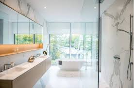 A blend of neutrals, including tan and white, contribute to this bathroom's timeless appeal. Latest Trends Modern Bathroom Design In Neutral Colors