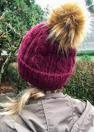 Ravelry Cables Love Pom Poms Pattern By Jami Brynildson Knitting Patterns Free Hats Cable Knit Hat Pattern Cabled Hat Pattern