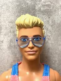 Ken doll with glasses top