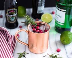 A Holiday Moscow Mule Recipe Served In A Copper Mug Holiday Cocktails Moscow Mule Recipe Holiday Cocktail Recipe