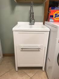 The utility kit has a metal strainer, Schon Eleni All In One Kit 24 In X 22 In X 37 8 In Acrylic Utility Sink With Cabinet In White Mo 1067w The Home Depot In 2021 Laundry Room Diy Utility Sink Sink Cabinet