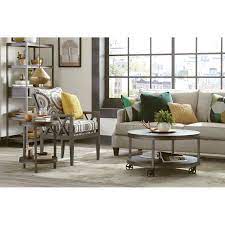 The hammary furniture austin round cocktail table evokes industrial flair with its dark steel base, and textured metal insert top. Round Coffee Table