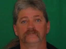 Fugitive killer found in Port Melbourne