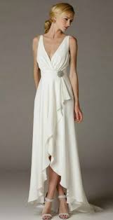 The high hemline will highlight your beach wedding sandals—or, if you choose to go barefoot, it'll show off your casual style. Simple Elegant High Low Wedding Dress For Older Brides Wedding Dresses High Low Wedding Dress Over 40 Wedding Dresses For Older Women