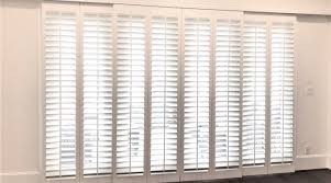 Shutters on sliding doors offer complete privacy. The Best Window Treatments To Cover A Sliding Glass Door Sunburst Shutters