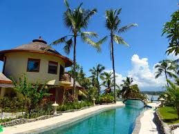 81 Steps From A Black Sand Beachfront Puri Dajuma Offers 4 Star Balinese Cottages In A Landscaped Garden It Boasts A Spa Outdoor Pool And Spa Pool