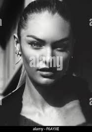 Victoria's Secret supermodel Candice Swanepoel shows off her flawless body  in a black bikini as she spends the day