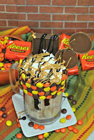 Chocolate ice cream, reese's peanut butter cup oreos and mini reese's peanut butter cups combine to create a delicious peanut butter cup milkshake. Reese S Milkshake Cocktail Mommy Travels