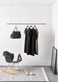 Interior Design Idea Coat Racks That Hang From The Ceiling Steel Cords And A Stainless Steel Ro Clothes Rack Design Hanging Clothes Racks Diy Clothes Rack
