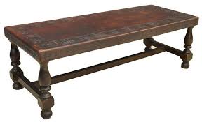 This piece has the ability to function as a coffee table or side tables. Lot Art South American Tooled Leather Top Coffee Table