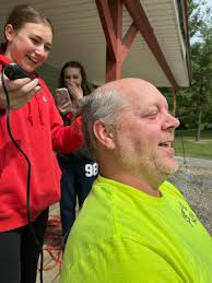 Fundraiser for kids activities at the lake with hair shaving event