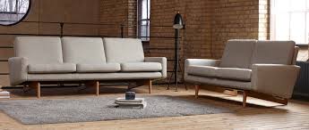 Our story showroom csr profile newsletter b2b newsletter jobs. Kopenhagen Designer Sofas Mit Polsterarmlehnen Und Holzfussen Kopenhagen Und Kopenhagen Oak Als 2 Sitzer Oder 3 Sitzer Al Sofa Design Sessel Sessel Mit Hocker