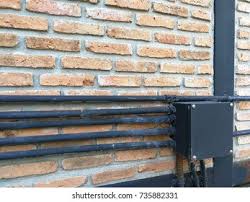 Wall conduits are used to connect pipes on the outside of the pool with the parts inside the pool (wall inlets, hydraulic parts, adapters to connect pool lights, vacuum points, etc.) Brick Wall Electrical Conduit Pvc Conduit Stock Photo Edit Now 735882331