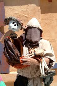Photo of Ded Bob (a skeleton puppet) and Smuj (the puppeteer)