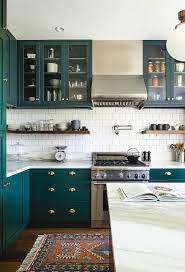 My online designer friend abby manchesky remodeled her kitchen for the one she painted her lower cabinets dark green but replaced the upper cabinets with open shelving. 34 Top Green Kitchen Cabinets Good For Kitchen Get Ideas