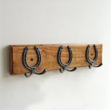Check spelling or type a new query. A Vintage Style Wooden Oak Colour Wall Coat Rack With Cast Iron Horses Jonesandgrey