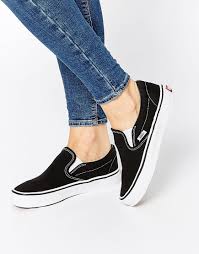 Vans Classic Black Slip On Trainers At Asos Com Black Slip On Trainers Black Slip On Sneakers Vans Classic Black